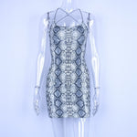 Hugcitar backless hollow out sexy bodycon dresses 2018 autumn women fashion club snakeskin print mini club dress